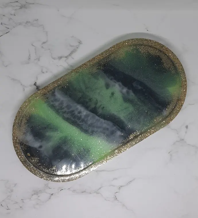 Vide poche Noir et vert